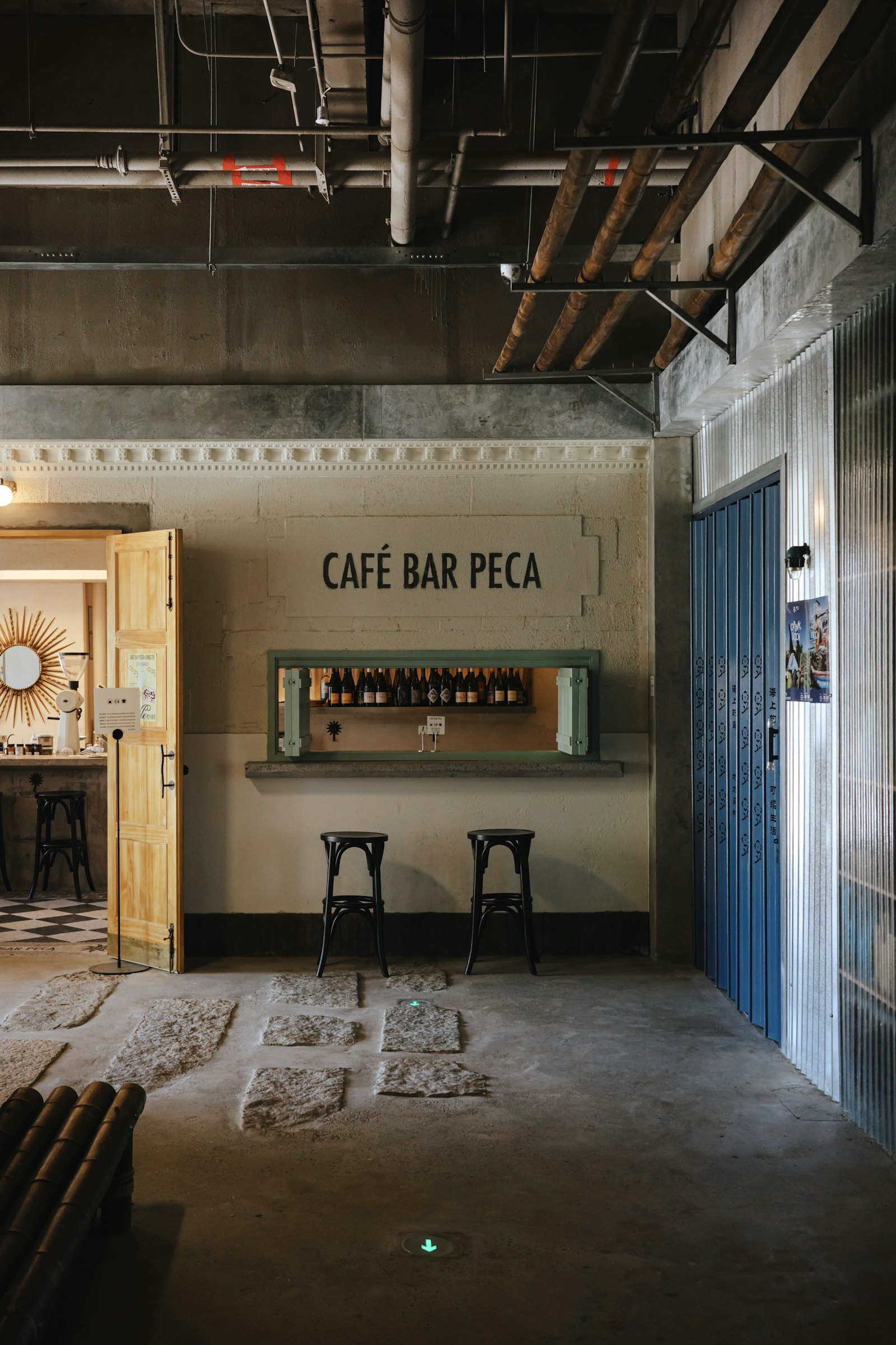 A cafe counter with coffee being made